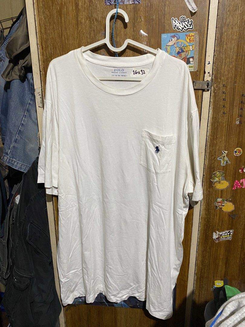 Polo Ralph Lauren White Pocket Tee XLT (Category: Tshirts & Polo Shirts ) located in Imus. Submitted by frootiloots4103 (Listing ID 1467153785, Image 1). Description: - Brand: Polo Ralph Lauren - Color: Solid White - Size: XLT (185/124C) - Pit to Pit: 26 inches - Length: 32 inches - Details: Classic crew neck, single chest pocket with signature embroidered blue pony logo - Material: Clean cotton fabric - Condition: Excellent / Ready to wear OPEN 