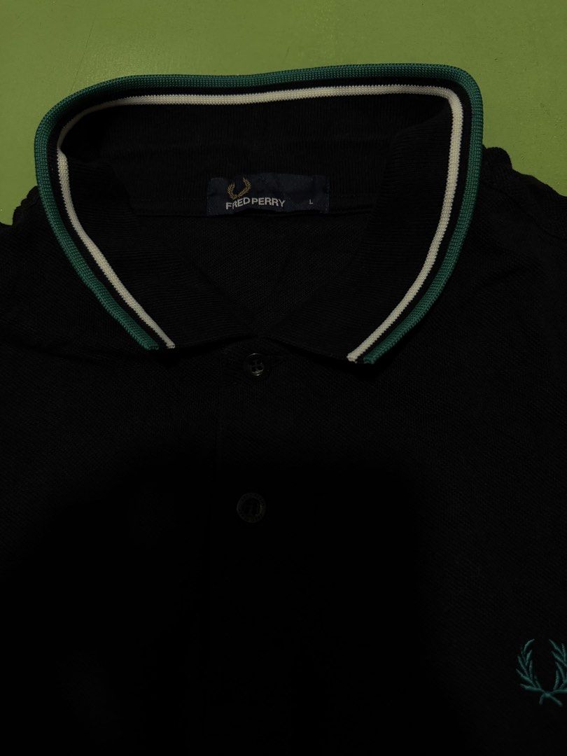 Polo Shirt (Category: Tshirts & Polo Shirts ) located in Pasig City. Submitted by reyeslarry11740 (Listing ID 1467109812, Image 3). Description: For Sale Fred Perry Polo Shirt Men Black Legit Size Large 21w x 27.8L Good as new No issue 1700 plus ship only Payment 1st Pasig city.