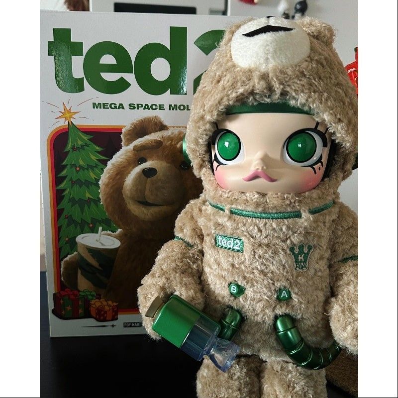 POP MART Ted 2 Mega Space Molly Figure (Category: Designer & Blind Box Toys) located in Quezon City. Submitted by sashasarisarishoppe (Listing ID 1467067065, Image 3). Description: - Authentic Pop Mart Ted 2 x Space Molly crossover collectible - Features a fuzzy brown bear suit with green astronaut details and blaster accessory - Comes complete with original illustrated packaging box - Perfect rare piece for art toy and Pop Mart collectors.