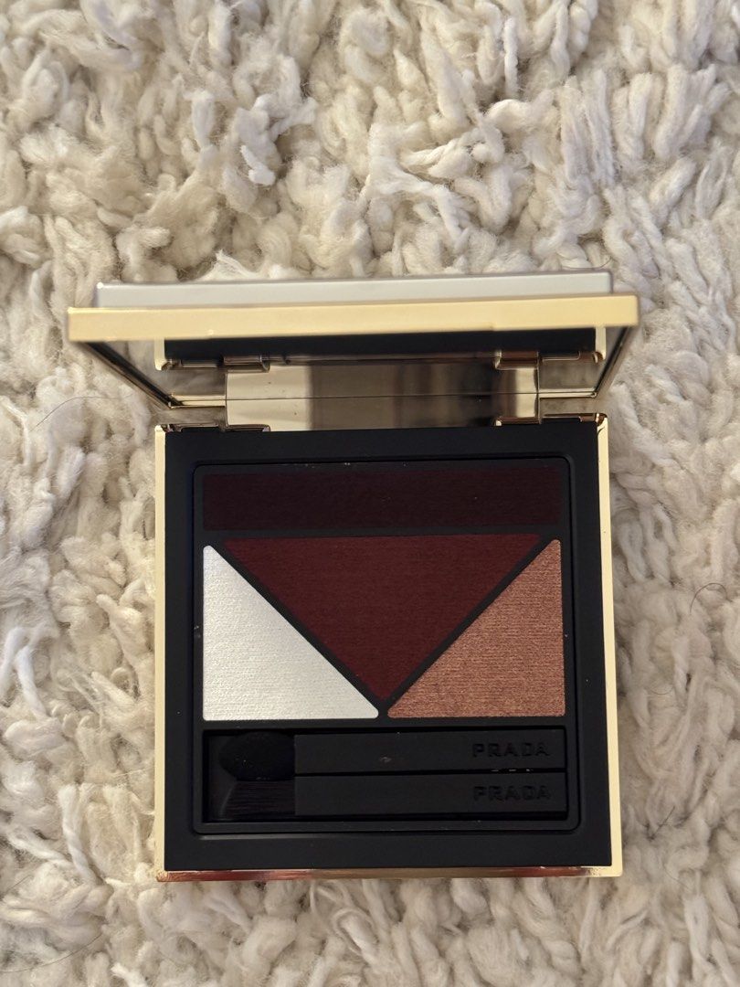 Prada Dimensions Durable Multi-Effect Eyeshadow B03 (Category: Makeup) located in San Nicolas. Submitted by ihascat (Listing ID 1467021398, Image 2). Description: - Authentic Prada Eyeshadow Palette (Shade: B03) - Net Weight: 6g - Rich pigmentation with stunning matte and metallic finishes - Eco-friendly refillable and rechargeable luxury compact - Includes original box and dual-ended applicators - Perfect for effortless everyday looks or glam ni