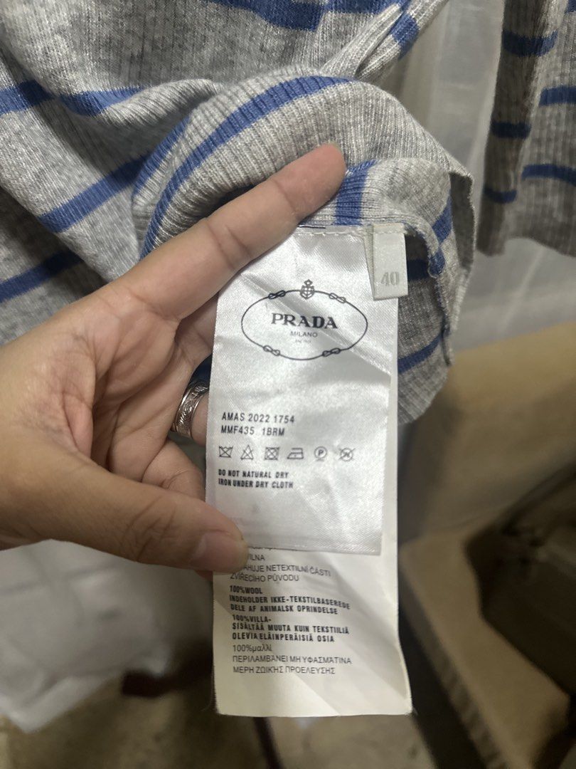 Prada knit top (Category: Blouses) located in Quezon City. Submitted by slluxury_ph (Listing ID 1467035576, Image 3). Description: Prada knit top Size 40 Best fit Small to up to semi large frame Semi stretch fabric.