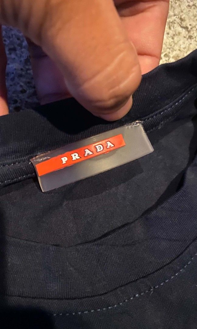 Prada LongSleeve CrewNeck! (Category: Activewear) located in Leyte. Submitted by jimsalbero420. (Listing ID 1467082998, Image 3). Description: Prada LongSleeve CrewNeck! As New Condition Size Xl On Tag missing washtag Width -22 Length -29.