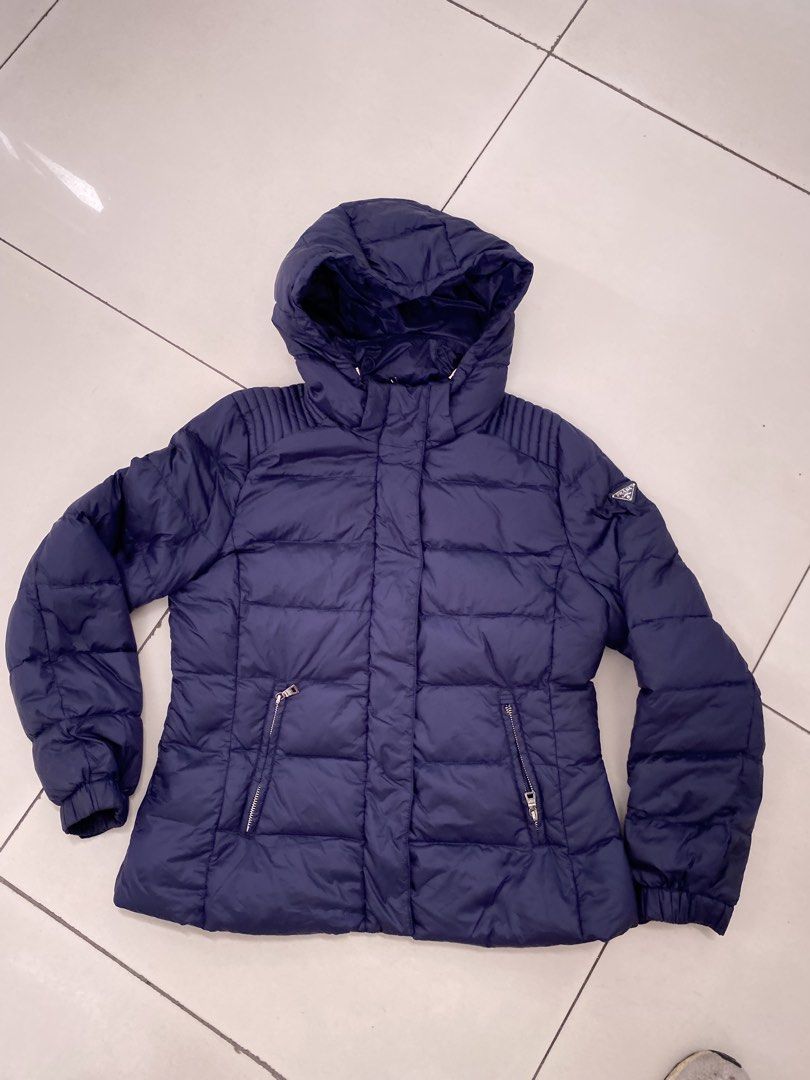 Prada puffer jacket triangle logo (Category: Luxury Apparel) located in Muntinlupa City. Submitted by twoangels.11.14.2023 (Listing ID 1466989913, Image 1). Description: Prada puffer jacket Size 42 Triangle logo shoulder Like new.