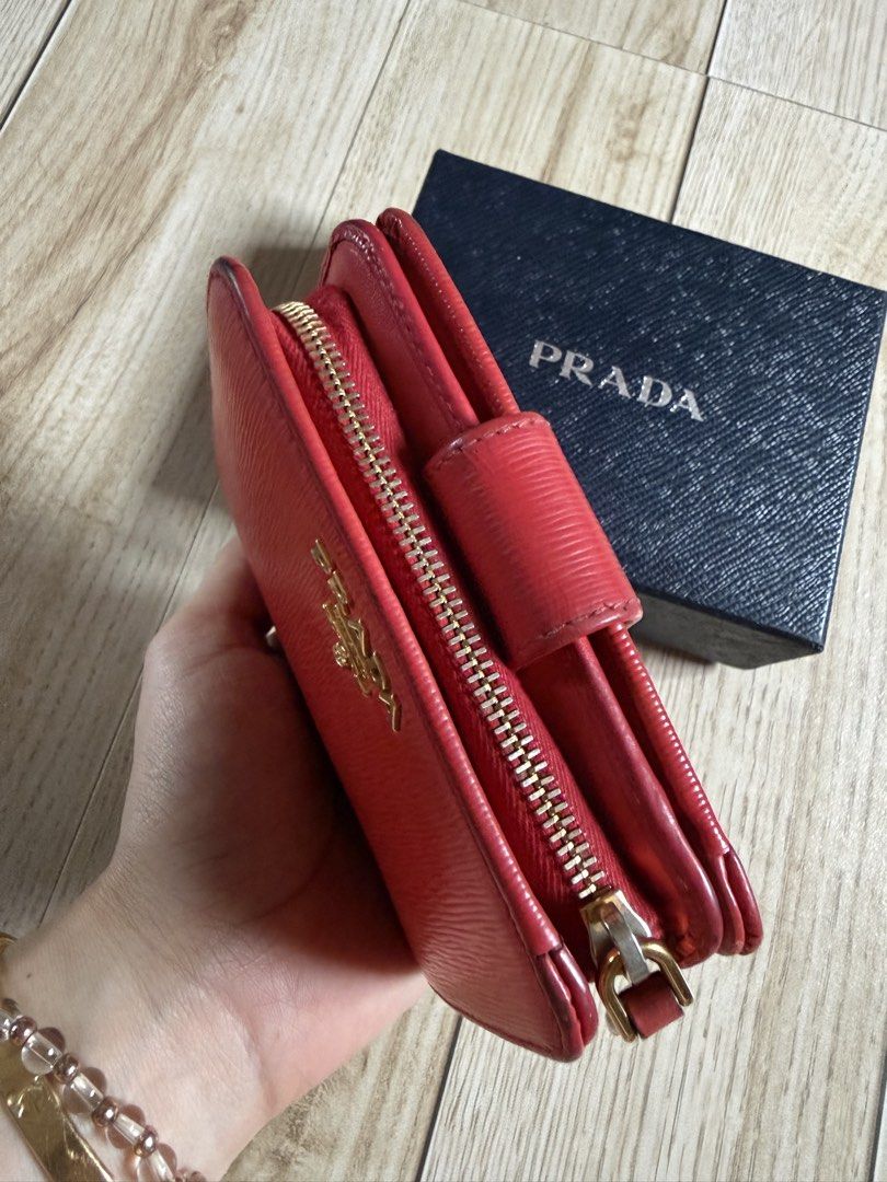 PRADA RED (Category: Luxury Bags & Wallets) located in Manila. Submitted by mariadarna (Listing ID 1467144643, Image 3). Description: Prada wallet with box! Authentic 💯‼️ bought in Japan 🇯🇵 .