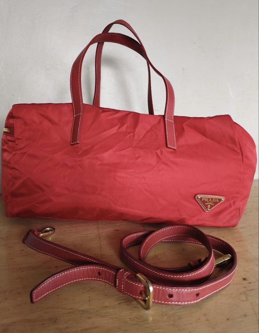 PRADA TWO-WAY BAG (Category: Cross-body Bags) located in Batangas. Submitted by stopandshopforluxury (Listing ID 1467074464, Image 1). Description: Guaranteed Original 💯 Prada two-way bag With coa Minor sign of usage sa handle as seen on the photo. Disclaimer: This is a preloved bag. Actual condition is shown in photos. Expect normal signs of wear. Colors may slightly vary due to lighting. Please check all photos and ask questions before claimin