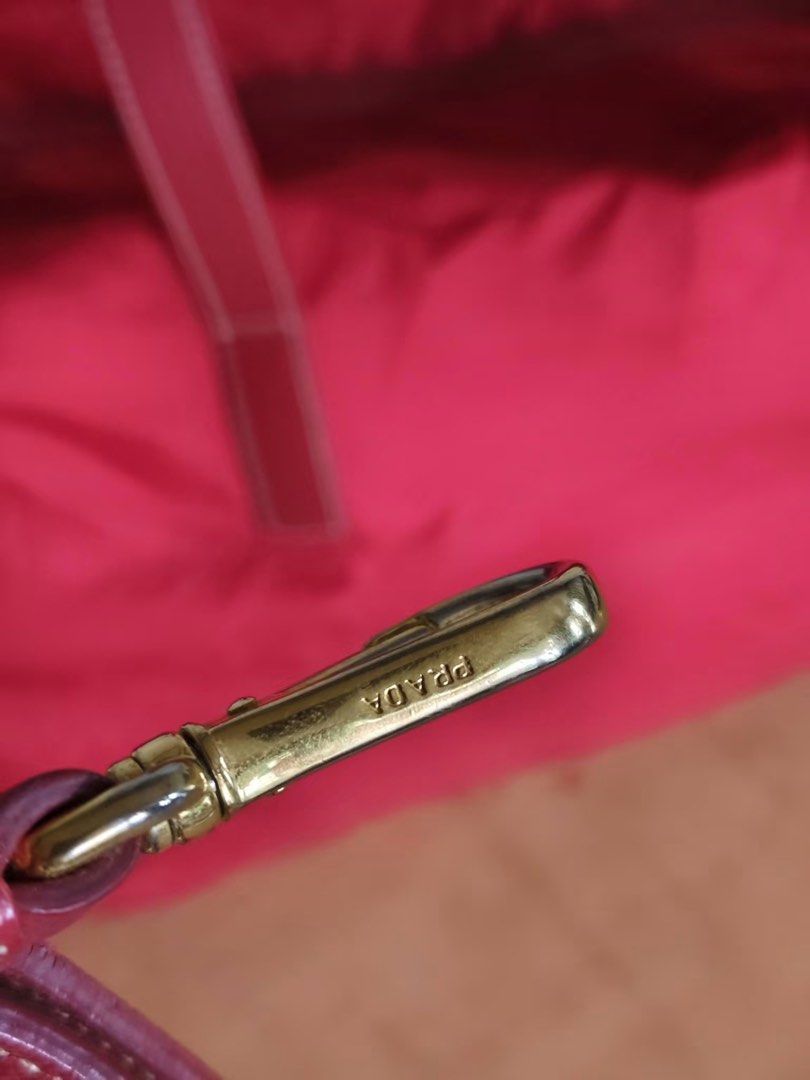 PRADA TWO-WAY BAG (Category: Cross-body Bags) located in Batangas. Submitted by stopandshopforluxury (Listing ID 1467074464, Image 3). Description: Guaranteed Original 💯 Prada two-way bag With coa Minor sign of usage sa handle as seen on the photo. Disclaimer: This is a preloved bag. Actual condition is shown in photos. Expect normal signs of wear. Colors may slightly vary due to lighting. Please check all photos and ask questions before claimin