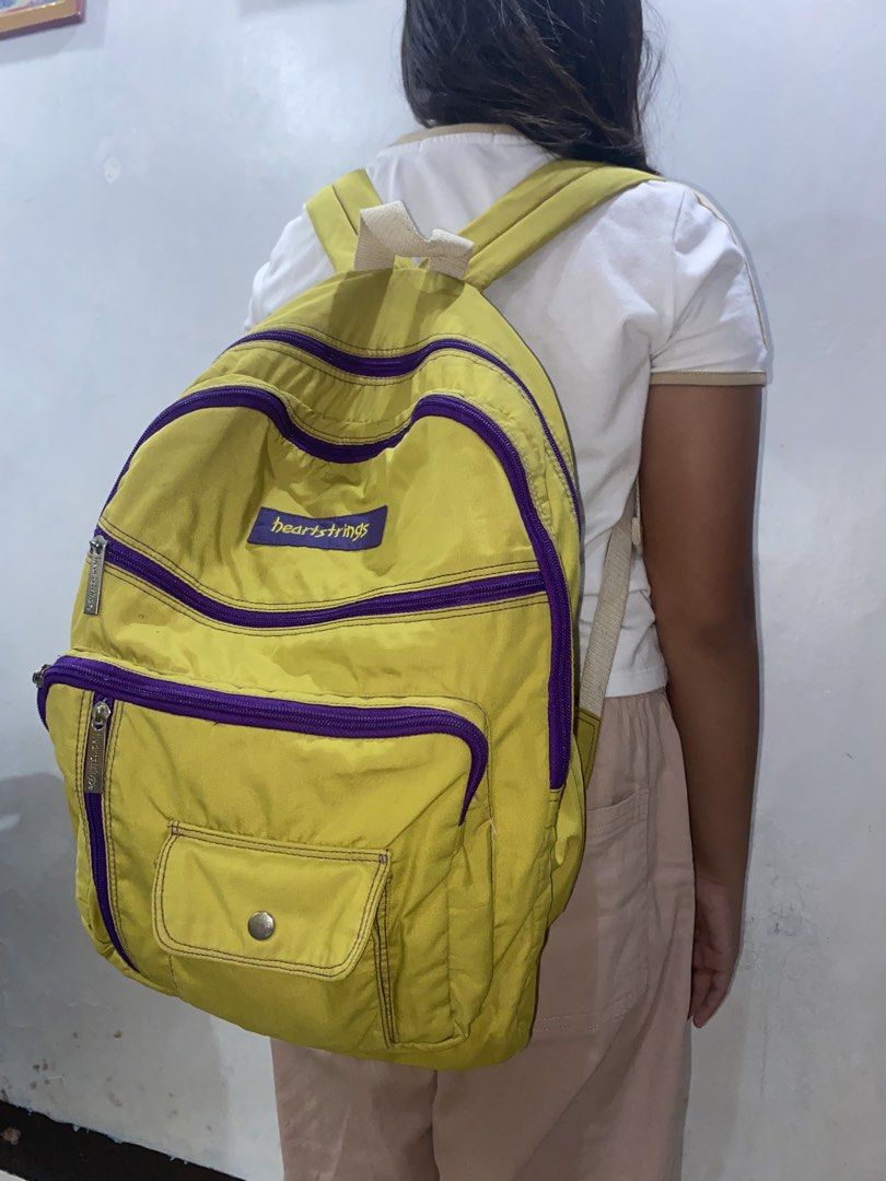 Preloved Heartstrings backpack (Category: Backpacks) located in Manila. Submitted by martinimnida (Listing ID 1467076156, Image 2). Description: The exterior of the bag is in good condition, although there are a few minor stains on the inside. The bag has multiple zipper compartments. .