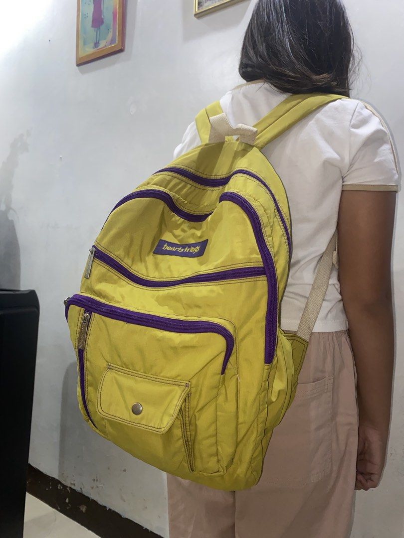 Preloved Heartstrings backpack (Category: Backpacks) located in Manila. Submitted by martinimnida (Listing ID 1467076156, Image 3). Description: The exterior of the bag is in good condition, although there are a few minor stains on the inside. The bag has multiple zipper compartments. .