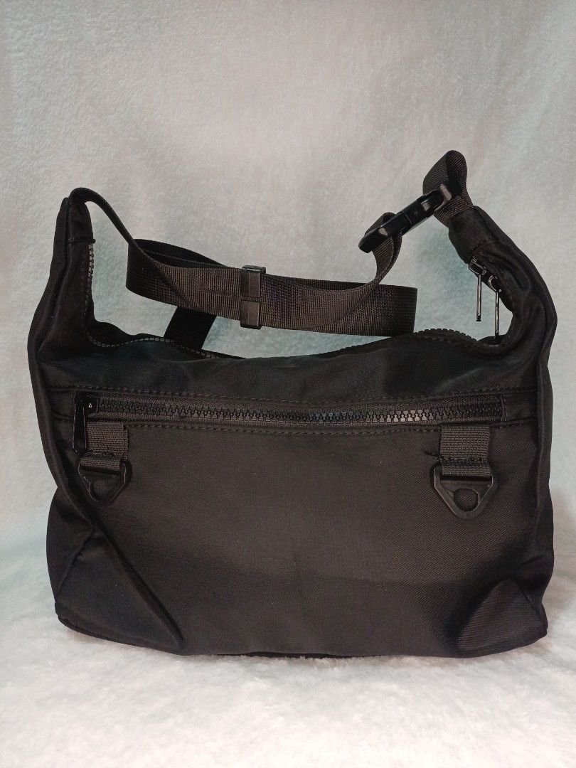 PRELOVED Messenger Bag Large Capacity (Category: Sling Bags) located in Rizal. Submitted by aeramos26 (Listing ID 1467105632, Image 2). Description: Please see the details in each photo MINE | PM screenshot | Direct Checkout antipolo, rizal MOP: Payment First | COD (with additional fee) MOD: Direct Regular Ship | Lalamove | SCO | TCO Color may vary because of lighting NO ORDER FORM. NO PM. NO PAYMENT. NO ORDER COMFIRMATION.