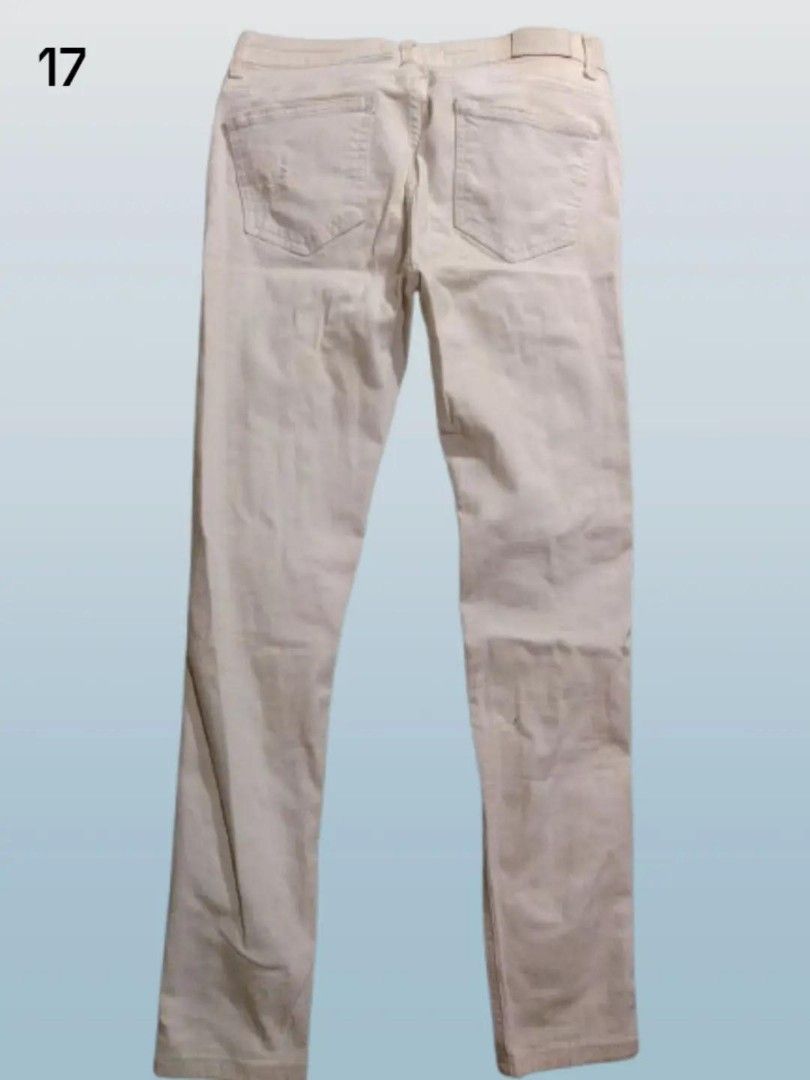 pre-loved off-white ripped jeans (Category: Jeans) located in Rizal. Submitted by thecycreatives (Listing ID 1466996798, Image 2). Description: - 100 - bershka - never used but matagal na naka stock sa maleta - issue: need i-wash - waist: 29 inches (flat measurement: 14.5 inches) - length: 94 cm details: Off-white/cream heavily ripped denim jeans with front shredding (makapal at medyo mabigat).