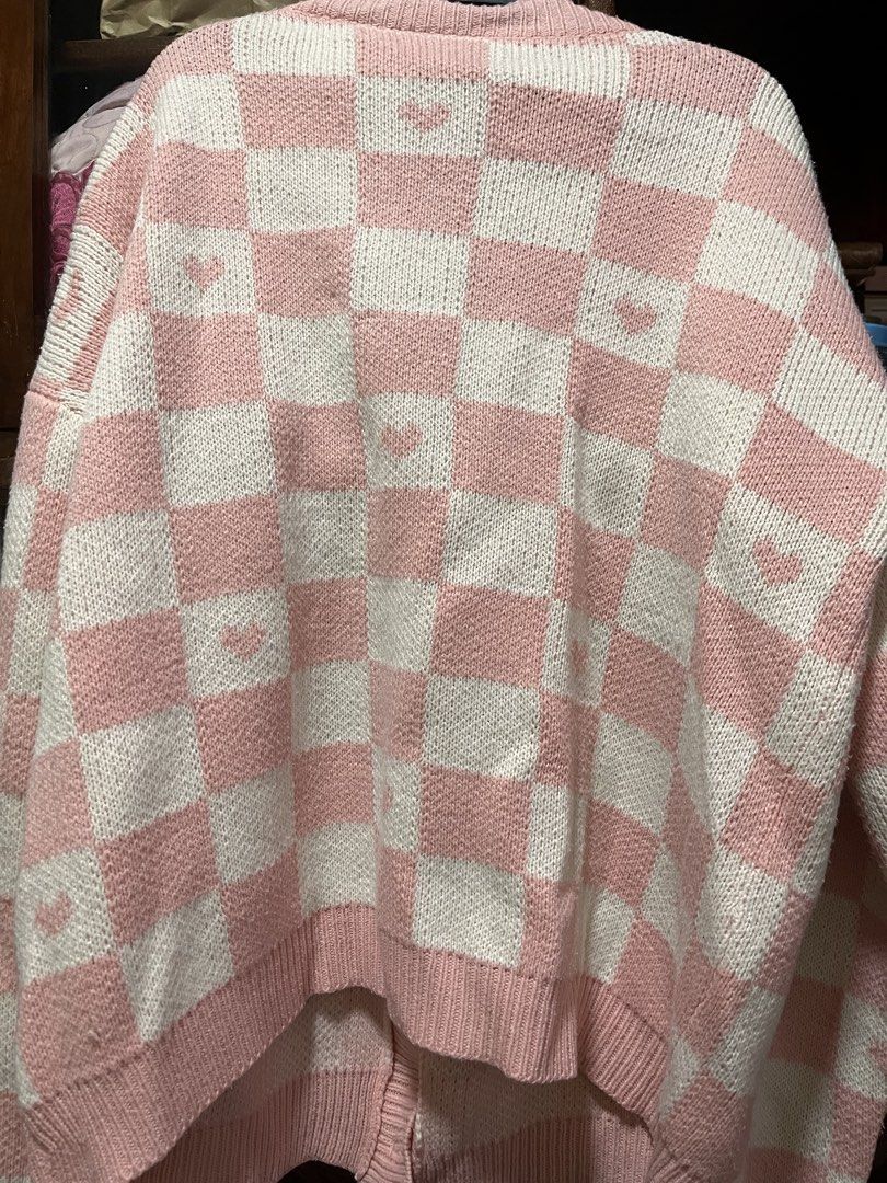 Pre-Loved Pink Checkered Cardigan 💗 (Category: Coats, Jackets and Outerwear) located in Manila. Submitted by schanschan (Listing ID 1467003744, Image 2). Description: Bought for PHP 700 Shipped from China Large to XL Size Thick & Knitted RFS: Decluttering Actual color differs from picture—pastel pink in person 📦 SF to be shouldered by buyer ✅ GCash Payment Only 📍 From Malabon area.