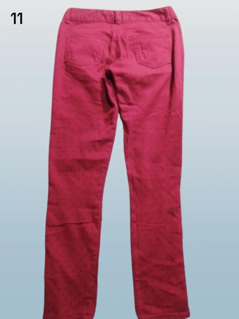 pre-loved red polka dots jeans (Category: Jeans) located in Rizal. Submitted by thecycreatives (Listing ID 1466994848, Image 2). Description: - 70 - brand/patch: alcia luna - never used - no issues - waist: 29 inches (flat measurement: 14.5 inches) - length: 98 cm details: burgundy/maroon red stretchable pants featuring an all-over black polka dot design, made from medium-weight fabric..