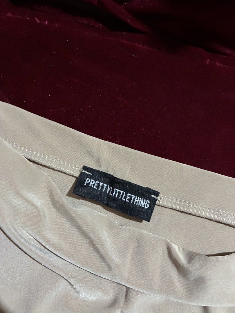 PRETTYLITTLETHING Nude Midi Skirt (Category: Skirts) located in Quezon City. Submitted by judsnasps (Listing ID 1467123341, Image 1). Description: - Brand: PRETTYLITTLETHING - Color: Nude - Length: Midi - Fit: Body-hugging with smooth, stretchy fabric - Waistband: Comfortable elastic slip-on style - Waistline: Fits 27-28 inches (has excellent stretch recovery) - Total Length: 35 inches (midi to maxi length depending on your height) - Style: Clean