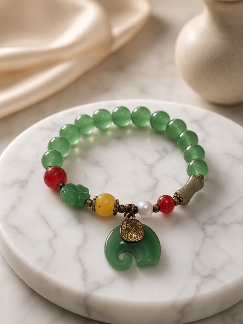 Prosperity & Harmony Gemstone Bracelet (Category: Bracelets) located in San Juan City. Submitted by exclusivelyours (Listing ID 1467086313, Image 1). Description: An elegant blend of rich green beads, colorful accent stones, and a distinctive jade-look pendant. Inspired by traditional Chinese motifs associated with harmony, good fortune, and prosperity, this bracelet adds a touch of timeless oriental charm to your everyday style. A lovely accesso