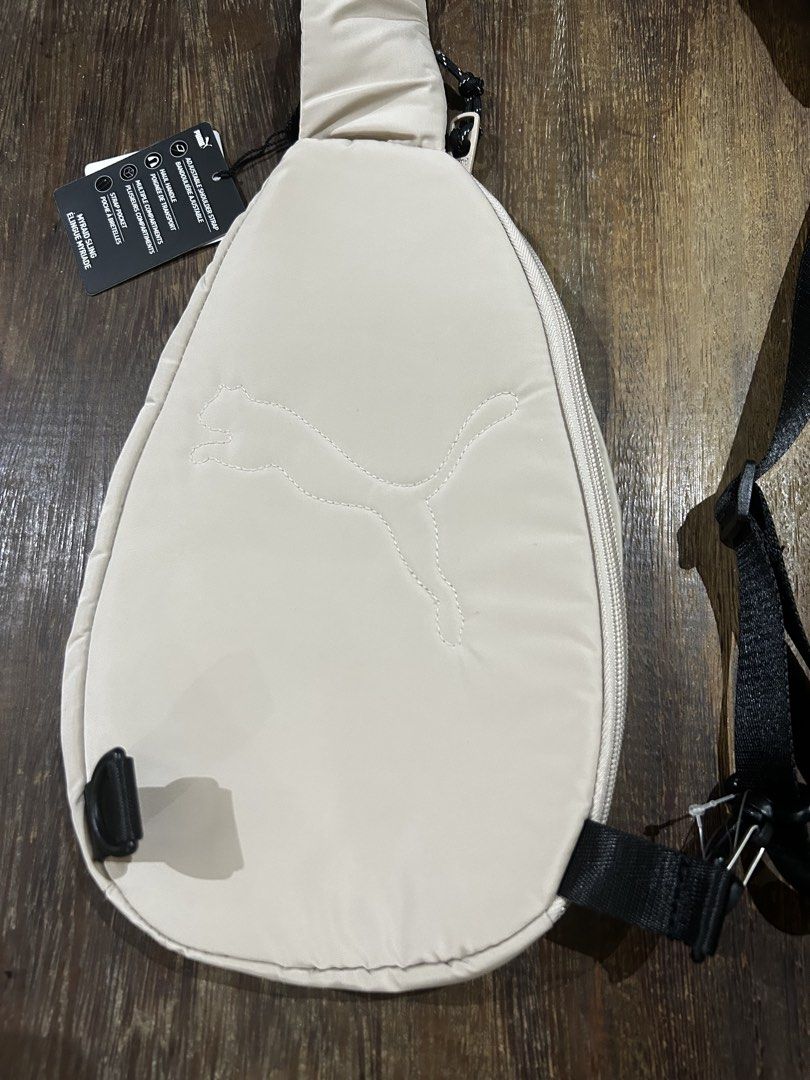 Puma Evercat Myriad Sling (Tag attached) (Category: Sling Bags) located in Paranaque City. Submitted by tinsj (Listing ID 1467052903, Image 3). Description: The item is brand new with the original tag still attached. There are two very tiny stains at the back, which are barely noticeable and covered when worn (see last 2 photos for reference..