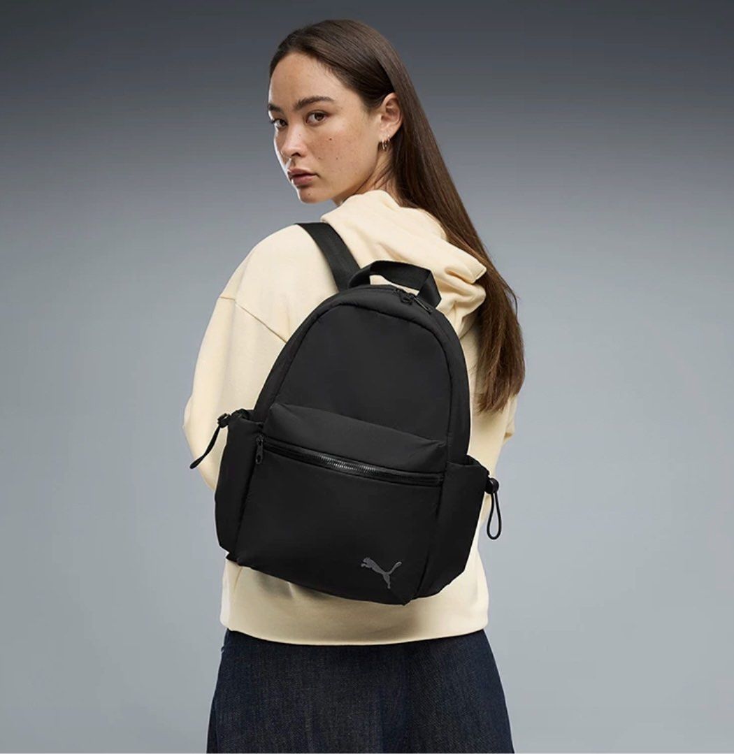 PUMA Her Small Backpack Black (Category: Backpacks) located in Manila. Submitted by costephm (Listing ID 1467069401, Image 2). Description: - Brand new with original tags attached - Color: Sleek solid black with subtle Puma logo - Size: Compact, ideal for daily commutes and casual lakwatsas - Features: Front zippered pocket, sturdy top handle, and adjustable shoulder straps - Condition: 100% clean and never used - retails for 2,400 (zalora) - BDO