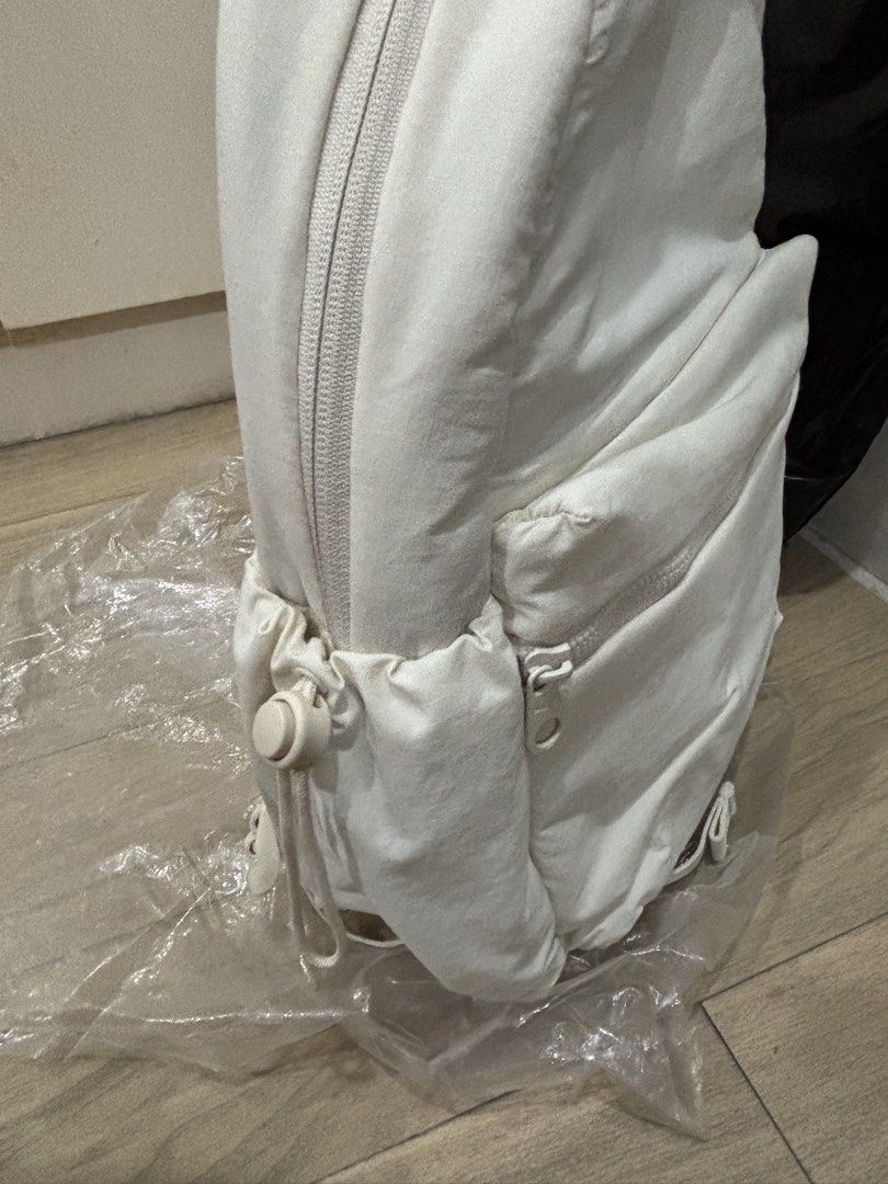 Puma Her Small Backpack Off-White (Category: Backpacks) located in Manila. Submitted by costephm (Listing ID 1467070161, Image 3). Description: - Brand new with original tags attached - Color: Off-white - Capacity: Compact 13 litres (Dimensions: 37cm x 25cm x 12cm) - Storage: Two-way zip main compartment, front zipped pocket, and side slip pockets with elastic drawcords - Comfort & Portability: Adjustable webbing shoulder straps and top carry han
