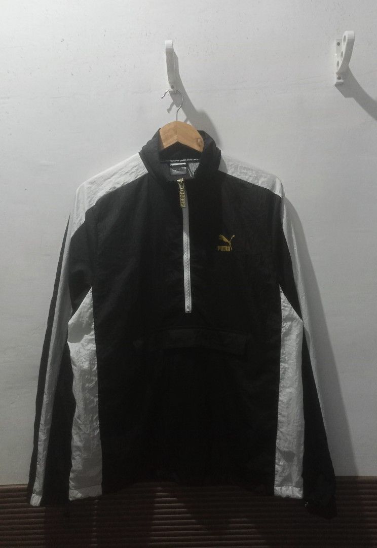 Puma Suede Windbreaker Size medium to large (Category: Coats, Jackets and Outerwear) located in Taguig. Submitted by mvdsh0p2022 (Listing ID 1467082039, Image 1). Description: - Brand: Puma - Item: Suede Windbreaker Jacket - Color: Black and White - Size: Medium (M)to large - Style Number: 574979-01 - Features: Gold foil Puma logo, custom 'SUEDE' metal zipper pull - Pockets: Front kangaroo pocket with secure zipper closure - Interior: Comfortable