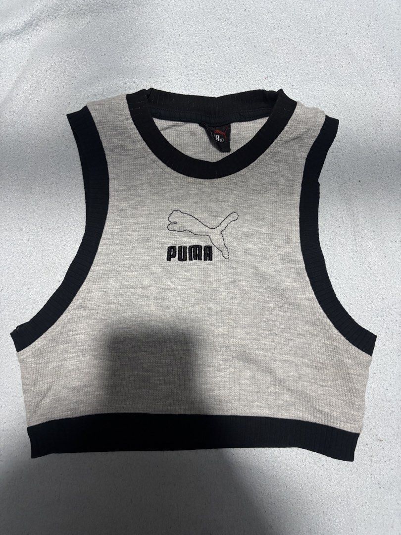 Puma tank top (Category: Activewear) located in Pasig City. Submitted by dealwithgia (Listing ID 1467024135, Image 3). Description: not strechy medium size 9/10 condition.