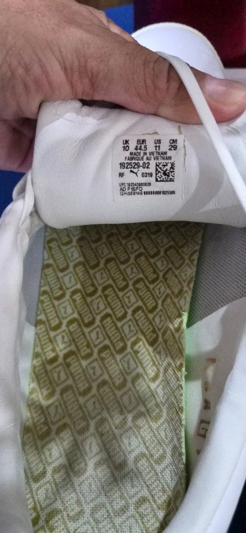 Puma GOLF White Leather Sneakers Size US 11 (Category: Sneakers) located in Manila. Submitted by pixiedachi (Listing ID 1467020716, Image 3). Description: - Brand: Puma Golf Shoes - Color: White with yellow insoles spikeless GOLF shoes - Style: Minimalist lace-up leather sneakers with classic heel cat logo - Size: 11 US / 44.5 EUR - Material: Premium leather upper with textured hexagonal rubber outsole - Condition: Light scuffing on soles from no