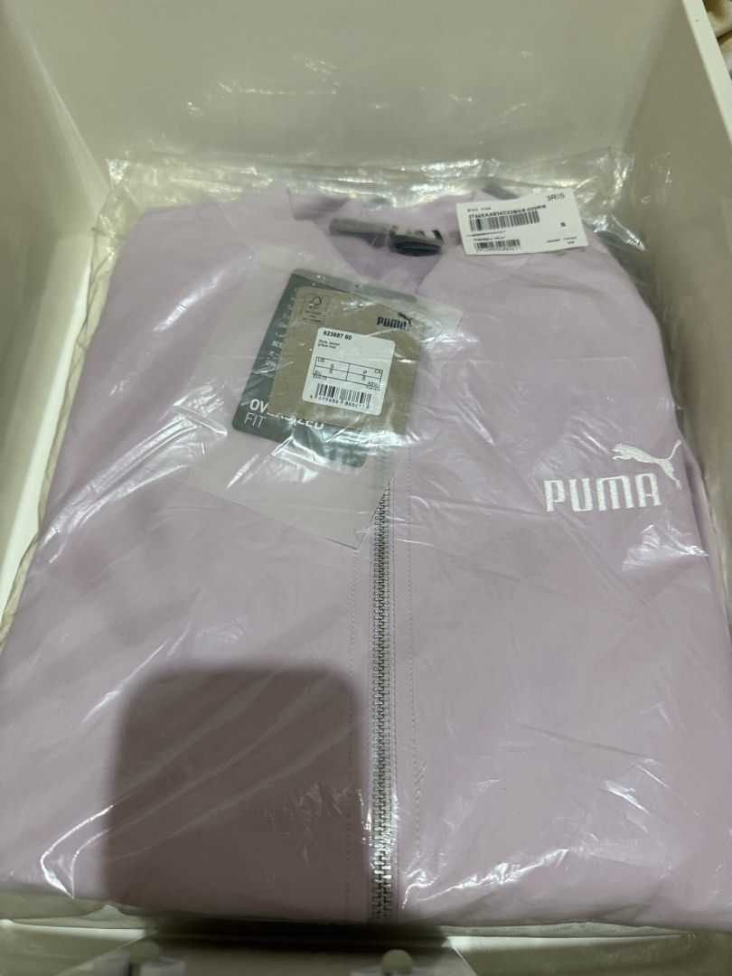 PUMA Women's Style Jacket Grape Mist S (Category: Coats, Jackets and Outerwear) located in Magalang. Submitted by lalalavieenrose (Listing ID 1467091361, Image 3). Description: - Brand: PUMA (100% Official Store Item) - Style: Women's zip-up jacket in Grape Mist colorway - Size: Small (Relaxed fit design) - Details: Zip-up front with ribbed collar and cuffs - Condition: Brand new with original retail tags (₱3,975 value).