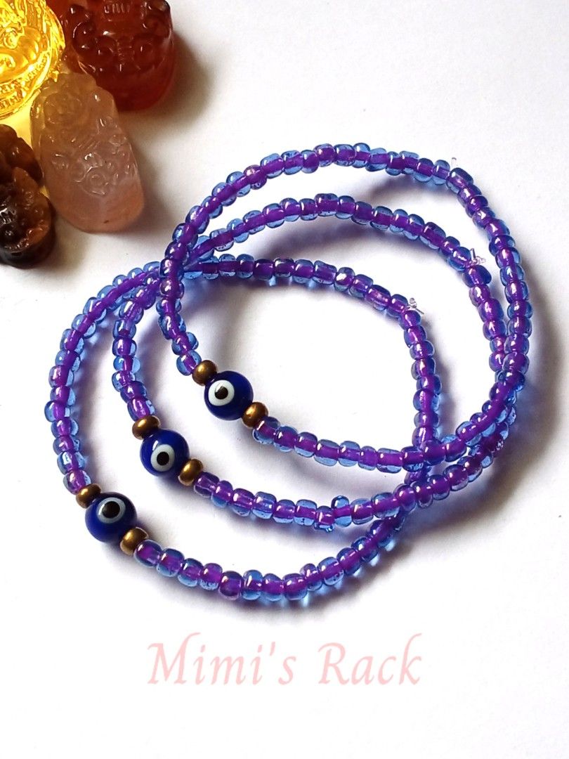 Purple & Blue Evil Eye Seed Bead Bracelet (Category: Bracelets) located in Taguig. Submitted by mimisrack (Listing ID 1466992001, Image 2). Description: 💜A pretty little bracelet featuring vibrant purple seed beads, accented with classic blue evil eye charms and gold-tone beads. ✨ The lovely color combination gives it a playful yet meaningful look, perfect for everyday wear or stacking with your favorite bracelets. 🧿 Evil Eye Symbolism - Protec