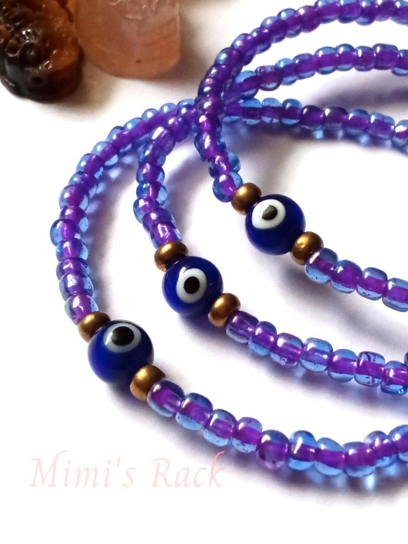 Purple & Blue Evil Eye Seed Bead Bracelet (Category: Bracelets) located in Taguig. Submitted by mimisrack (Listing ID 1466992001, Image 3). Description: 💜A pretty little bracelet featuring vibrant purple seed beads, accented with classic blue evil eye charms and gold-tone beads. ✨ The lovely color combination gives it a playful yet meaningful look, perfect for everyday wear or stacking with your favorite bracelets. 🧿 Evil Eye Symbolism - Protec