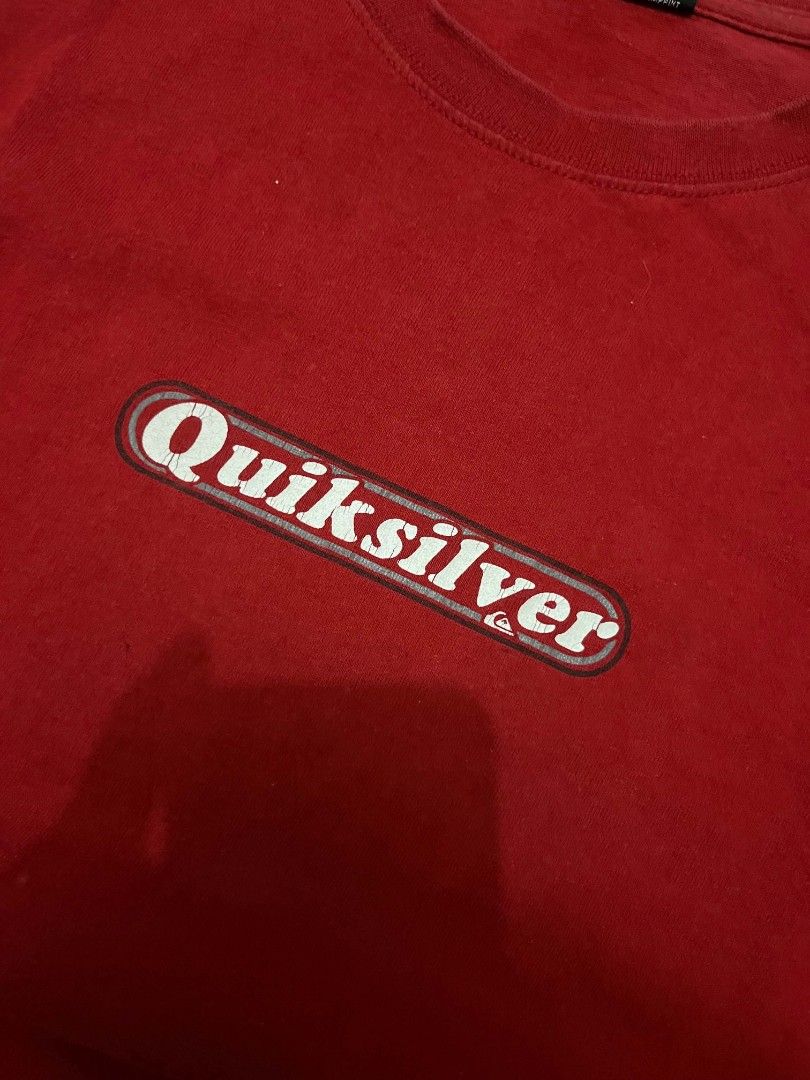 Quiksilver Red Graphic Tee Size M (Category: Tshirts & Polo Shirts ) located in Manila. Submitted by adzwilnams67005 (Listing ID 1467136198, Image 3). Description: - Brand: Quiksilver - Color: Vibrant Red - Size: Medium (Neck tag verified) - Design: Classic capsule logo print on chest and back - Details: Woven label on left sleeve hem, made in Mexico - Style: Casual everyday surf wear - Condition: Good pre-loved condition (Ready to wear) Quick si
