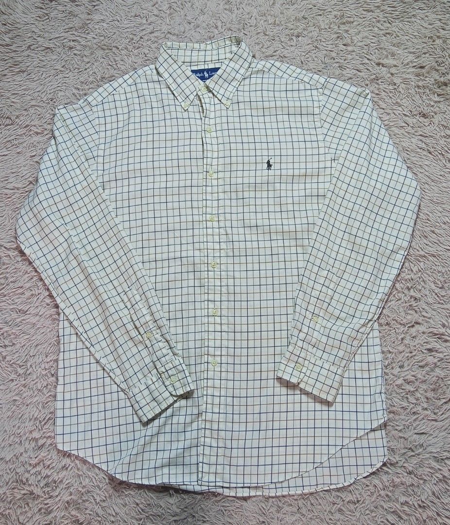 Ralph Lauren Blake & Classic Fit Shirts Bundle Size L (Category: Tshirts & Polo Shirts ) located in Lucban. Submitted by aeronroyyy (Listing ID 1466987992, Image 2). Description: - Brand: Ralph Lauren - Quantity: Bundle of 2 shirts - Size: Large - Shirt 1: Blue and white vertical stripes, Blake fit - Shirt 2: White with navy and brown plaid windowpane check, Classic Fit - Details: Button-down collars, button cuffs - Material: Cotton - Condition: 