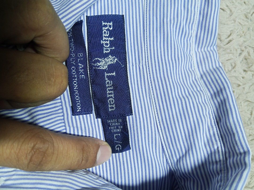 Ralph Lauren Blake & Classic Fit Shirts Bundle Size L (Category: Tshirts & Polo Shirts ) located in Lucban. Submitted by aeronroyyy (Listing ID 1466987992, Image 3). Description: - Brand: Ralph Lauren - Quantity: Bundle of 2 shirts - Size: Large - Shirt 1: Blue and white vertical stripes, Blake fit - Shirt 2: White with navy and brown plaid windowpane check, Classic Fit - Details: Button-down collars, button cuffs - Material: Cotton - Condition: 