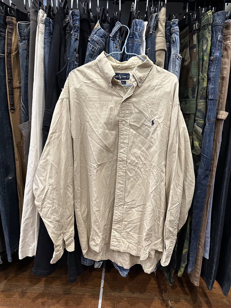 Ralph Lauren Blake Long Sleeve Button Down Shirt Beige (Category: Formal Shirts) located in Makati City. Submitted by hehehekdeg (Listing ID 1467030179, Image 1). Description: - Brand: Ralph Lauren (Blake Line) - Color: Neutral beige - Size: Large - Material: 100% breathable cotton - Features: Classic collar, front button closure, and signature embroidered polo player logo on the chest - Condition: Excellent - Style Tip: Versatile neutral tone th