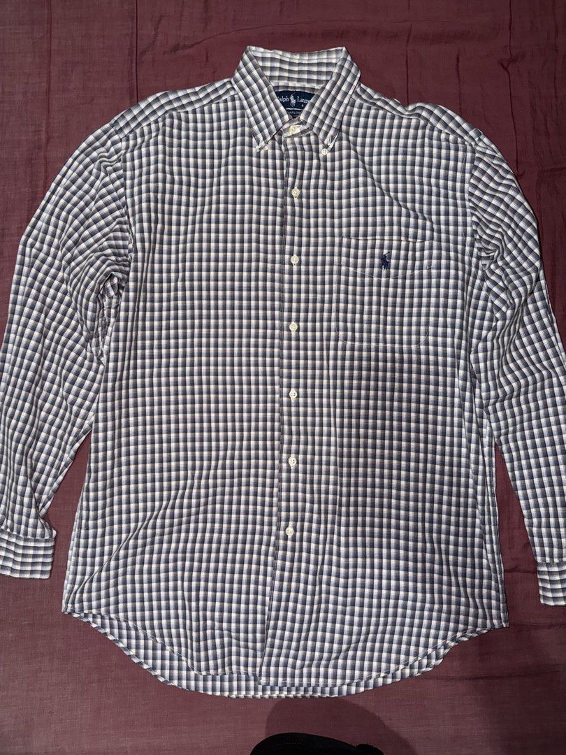 Ralph Lauren Marlowe Plaid Button-Up Shirt Medium (Category: Tshirts & Polo Shirts ) located in Manila. Submitted by chccj835237 (Listing ID 1466994673, Image 1). Description: - Brand: Ralph Lauren (Marlowe) - Style: Long sleeve button-up shirt with button-down collar - Pattern: Classic plaid (blue, grey, and white) - Details: Chest pocket with signature embroidered pony logo - Material: 100% cotton (Made in India) - Size: Medium (Standard fit) -
