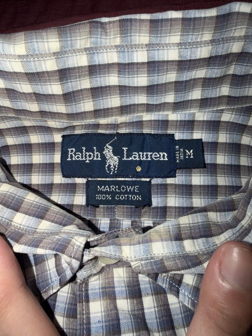 Ralph Lauren Marlowe Plaid Button-Up Shirt Medium (Category: Tshirts & Polo Shirts ) located in Manila. Submitted by chccj835237 (Listing ID 1466994673, Image 3). Description: - Brand: Ralph Lauren (Marlowe) - Style: Long sleeve button-up shirt with button-down collar - Pattern: Classic plaid (blue, grey, and white) - Details: Chest pocket with signature embroidered pony logo - Material: 100% cotton (Made in India) - Size: Medium (Standard fit) -