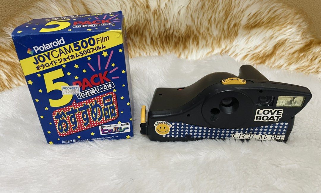 Rare Cecil Mcbee JoyCam Camera with cartridges AS IS (Category: Vintage Collectibles) located in Quezon City. Submitted by sissymissy1527 (Listing ID 1467113569, Image 2). Description: ➡️4packs of cartridge, naiopen yong isa to test at nasa loob ng camera. Expired na rin po yong cartridges but meron pa battery ang cartridge (exp. nov.2004) ➡️Joycam : flash in good working condition but yong yellow puller hindi nya na nya nahahatak ang paper film.