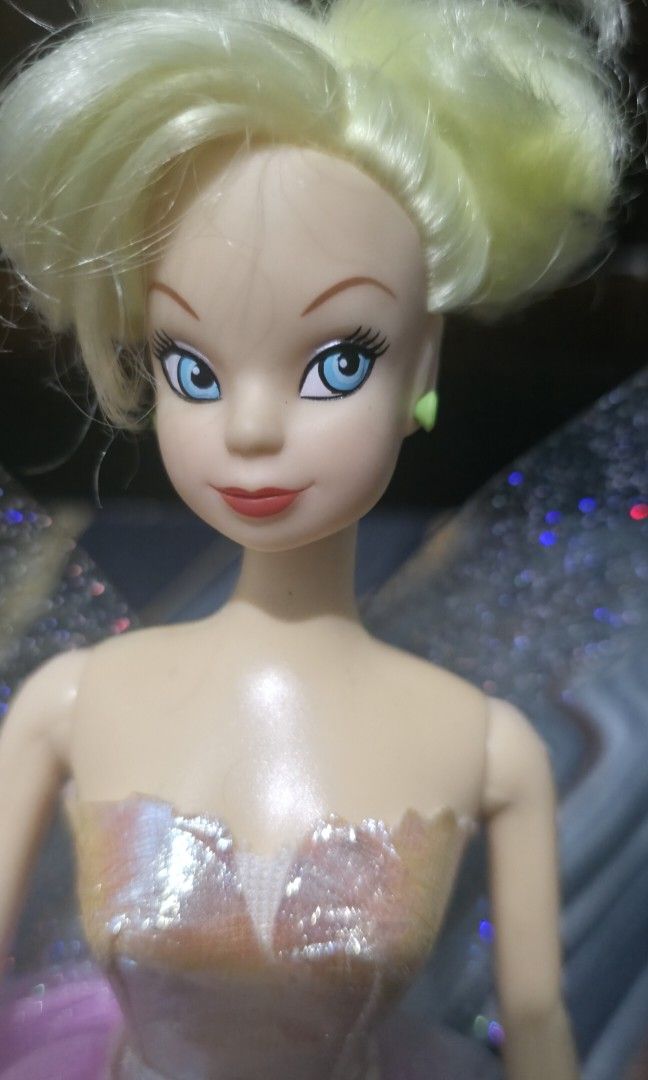Rare Vintage Simba Disney Tinkerbell doll (Category: Kids Toys) located in Pasig City. Submitted by thoyz_boulevard (Listing ID 1467140522, Image 3). Description: No issues No cracked neck No bite marks No paint chip Rubber legs (bendable) Wings are attached to the dress.