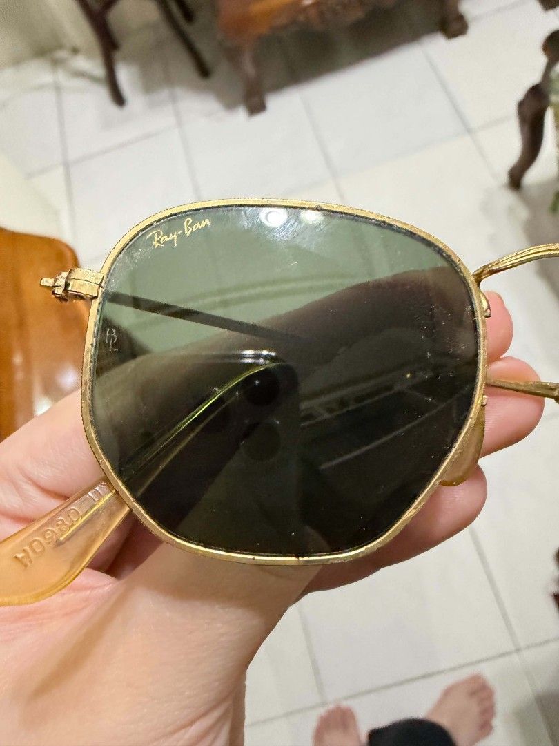 Ray Ban Vintage B&L Sunglasses (Category: Sunglasses & Eyewear) located in Quezon City. Submitted by aldenpv (Listing ID 1467090286, Image 2). Description: Ray Ban Hexagon Sunglasses Vintage and Authentic with Bausch & Lomb etching (see picture) LOCATION: South Caloocan near Monumento Minimal imperfections on frame which can be fixed No lens crack or major scratches Comes with its Pouch and Original papers RFS: Decluttering as it is not being use