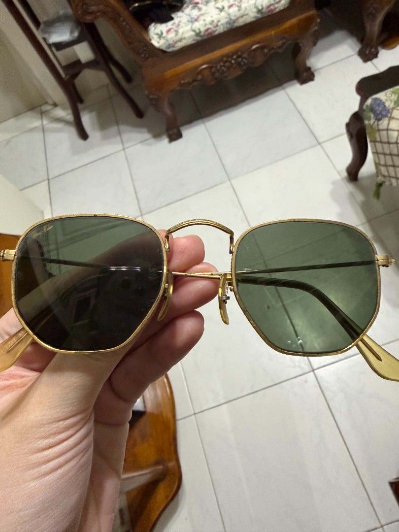Ray Ban Vintage B&L Sunglasses (Category: Sunglasses & Eyewear) located in Quezon City. Submitted by aldenpv (Listing ID 1467090286, Image 1). Description: Ray Ban Hexagon Sunglasses Vintage and Authentic with Bausch & Lomb etching (see picture) LOCATION: South Caloocan near Monumento Minimal imperfections on frame which can be fixed No lens crack or major scratches Comes with its Pouch and Original papers RFS: Decluttering as it is not being use