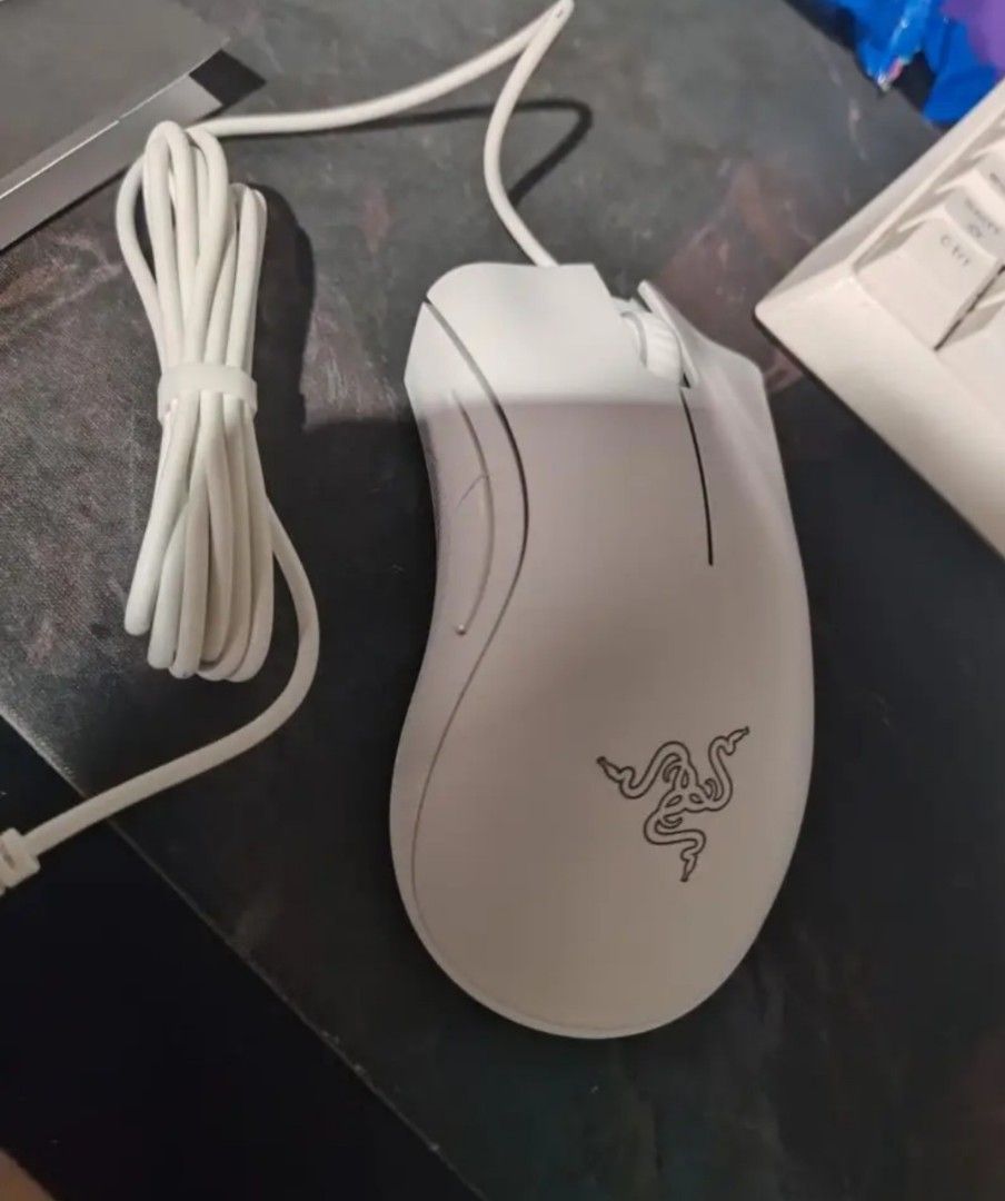 BRAND NEW Razer DeathAdder Essential WHITE (Category: Mouse & Mousepads) located in Manila. Submitted by adr14nbati25392 (Listing ID 1466991538, Image 1). Description: - Model: White Razer DeathAdder Essential gaming mouse - Comfort: Ergonomic design that fits the hand comfortably for long sessions - Performance: True 6,400 DPI optical sensor for accurate tracking - Controls: 5 programmable buttons for customized gameplay or work shortcuts - Conn