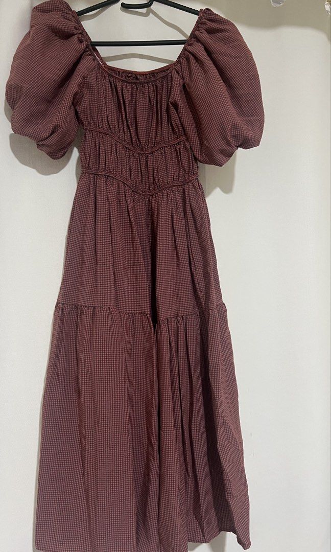 Red Gingham Puff Sleeve Midi Dress (Category: Dresses) located in Taguig. Submitted by xkmanzano078817 (Listing ID 1467097794, Image 2). Description: - Style: Red and black gingham midi dress with square neckline and short puff sleeves - Fit: Elasticated bust and flared tiered skirt with plenty of movement - Fabric: Very lightweight and easy to wear - Versatility: Perfect for both casual days and dressy occasions Seller’s Profile Height: 5’1” Wei