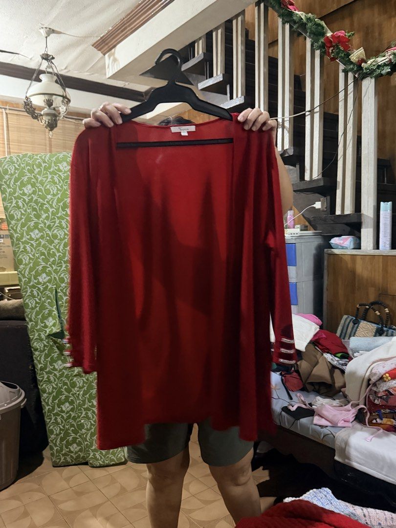 Red patterned zip-up hoodie with hood (Category: Hoodies) located in Quezon City. Submitted by BAYMAX72 (Listing ID 1466995999, Image 3). Description: - Color: Red with dark stripe pattern - Style: Long sleeves, front zipper closure - Fit: Relaxed and comfortable - Material: Soft, easy-to-wear everyday fabric - Condition: Excellent pre-loved/new (ready to ship).