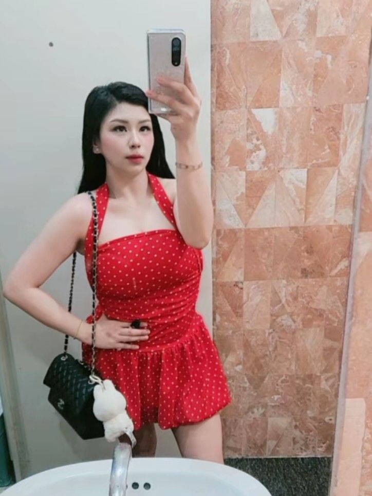 Red Polka Dot Halter Dress (Category: Dresses) located in Manila. Submitted by summerstyled (Listing ID 1467042840, Image 1). Description: - Color & Pattern: Vibrant red dress with classic white polka dots - Design: Fitted bodice, halter neck ties, and a playful flared short hem - Included Accessory: Chic black quilted chain bag featuring a soft white fluffy charm - Versatile Style: Perfect for casual day outs, dates, or weekend parties - Conditi