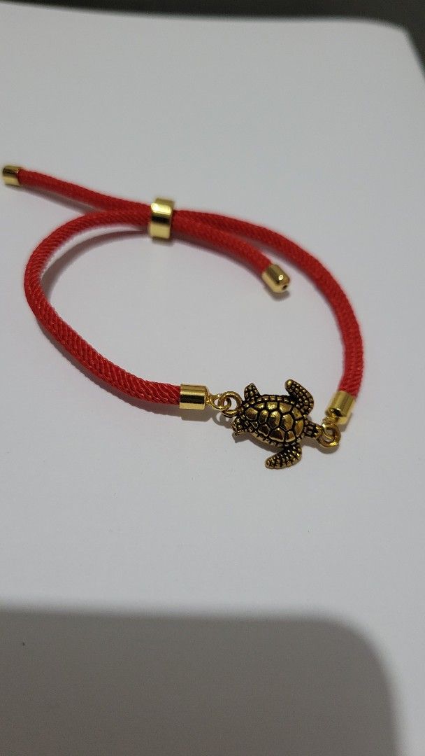Red string cord bracelet with gold turtle charm (Category: Bracelets) located in Pagsanjan. Submitted by closetfinds_marilyn (Listing ID 1467065249, Image 1). Description: #bracelet #redbracelet #ropebracelet #turtlecharm #fashionjewelry #jewelry ### 🐢 Red Cord Bracelet with Gold-Tone Turtle Charm Add a touch of charm to your everyday style with this **Red Cord Bracelet featuring a Gold-Tone Turtle Charm**! ❤️✨ Designed with a vibrant red cord a