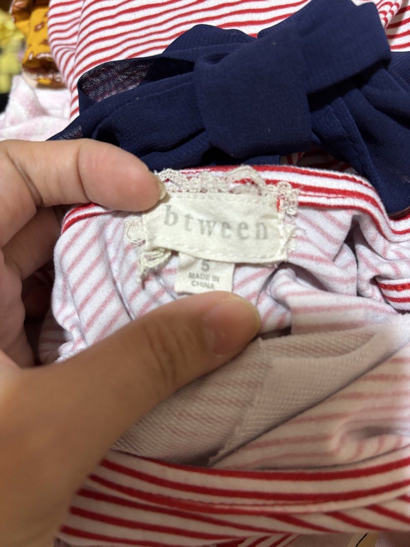 Red White Striped Unicorn Dress Size 4&5 (Category: Babies & Kids Fashion) located in Manila. Submitted by wardrobeinmnl (Listing ID 1462614203, Image 3). Description: SIZE: 4 & 5 - Adorable red and white striped dress for girls. - Features a sparkly unicorn design on the front. - Navy blue ribbon tie at the back for a cute accent. - Size: 4 - Origin: Made in China..