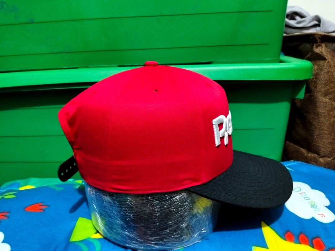 Reebok Classic Snapback Cap Red Black (Category: Caps & Hats) located in San Mateo. Submitted by JmThriftCap_Ph (Listing ID 1467113433, Image 2). Description: - Brand: Reebok Classic - Color: Bold Red and Black - Size: M-58 (Adjustable plastic snap closure) - Design: Large embroidered logo on front with 'R' detail on the back strap - Origin: Made in China.