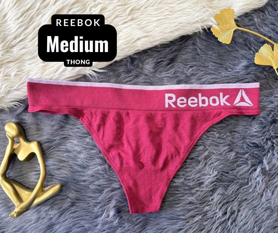 Reebok Pink Medium Thong Underwear (Category: Undergarments & Loungewear) located in Manila. Submitted by siashop. (Listing ID 1467166312, Image 1). Description: - Brand: Reebok - Style: Seamless thong - pink and white logo waistband - Size: Medium - Material: Comfortable, high-stretch fabric - Condition: Clean with clear branding -MOP: GCash - Shipping: Fast shipping via J&T Express (Buyer shoulders shipping fee).