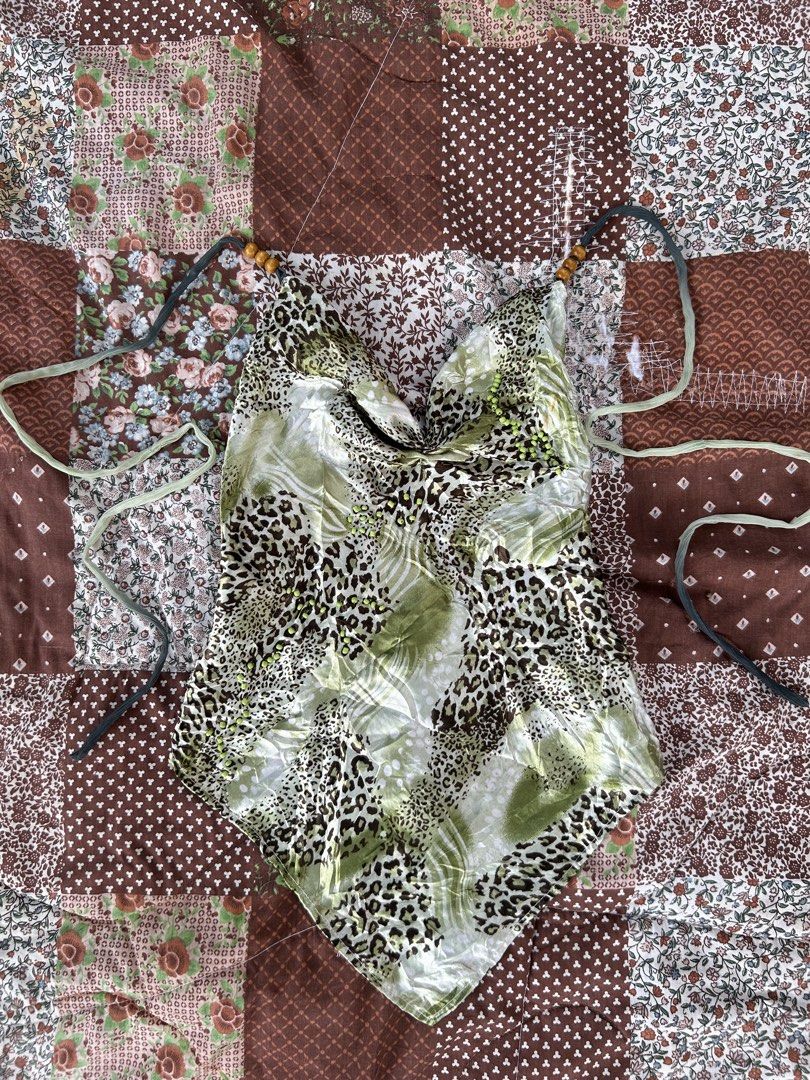 rework leopard fairycore self-tie y2k halter (Category: Blouses) located in Butuan. Submitted by kittyfinds444 (Listing ID 1466988410, Image 2). Description: • size: xs to medium • fabric bought from japan arrivals. • lowballers will be ignored. not selling it for lower price. willing to keep! •please check the photos before claiming. do not offer if unsure & still canvasing. we don’t accept unsure offers unless it’s paid to avoid conflicts. .