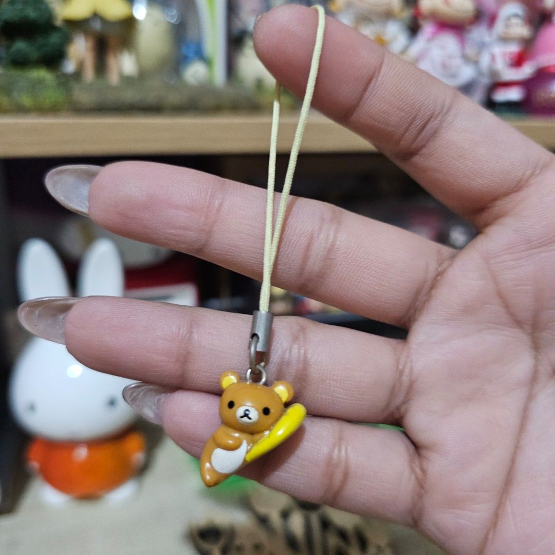 Rilakkuma Laying Phone Charm (Category: Character Goods) located in Manila. Submitted by lovelylovesjapan (Listing ID 1467092690, Image 1). Description: 🌸The item is on-hand and authentic from Japan 🌸Mode of Payment (MOP): GCASH/Bank Transfer 🌸Mode of Delivery (MOD): J&T or Lalamove (Shipping every Saturday and Sunday) Notes: 🩷Breakable items are packed with care and caution. Seller will not be held liable for any damages incurred by the cour