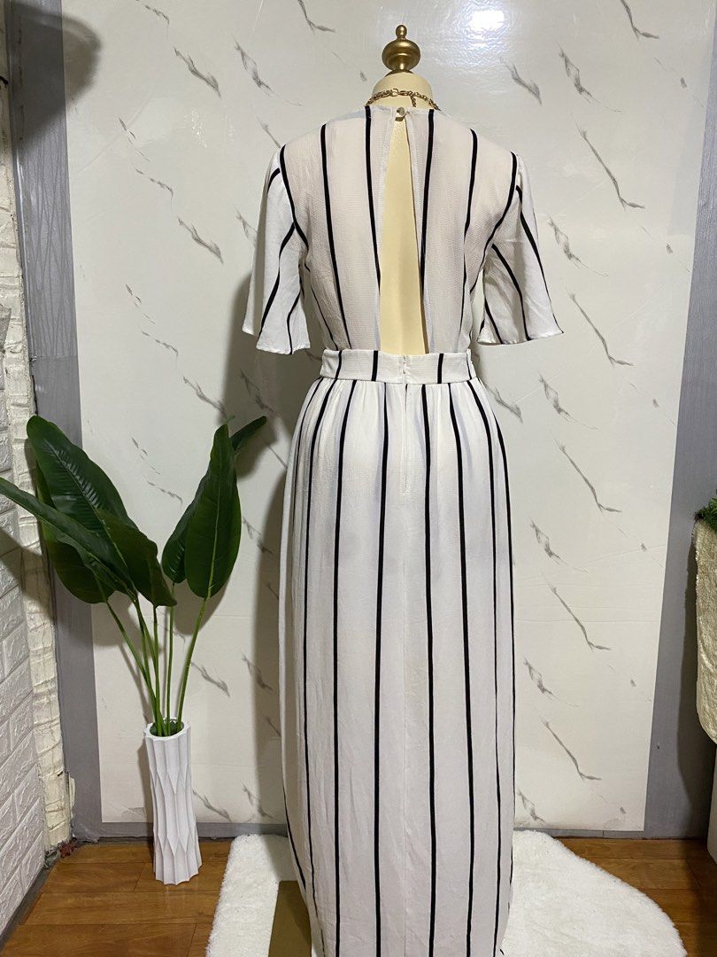 Romper dress maxi (Category: Rompers) located in Taguig. Submitted by KL_Outfits (Listing ID 1467067557, Image 3). Description: See photos to see flaws. May butas prng sumabit pde nmn ipabawas.