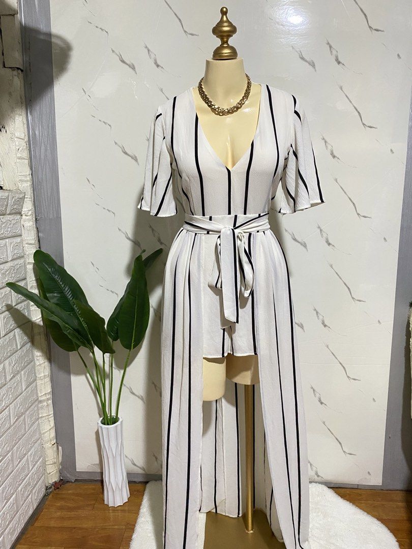 Romper dress maxi (Category: Rompers) located in Taguig. Submitted by KL_Outfits (Listing ID 1467067557, Image 1). Description: See photos to see flaws. May butas prng sumabit pde nmn ipabawas.