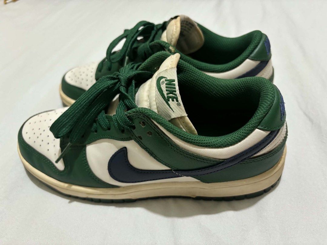 RUSH/DM FOR LP | Nike Dunk Low Retro Green Navy (Category: Sneakers) located in Manila. Submitted by segundamanoshop (Listing ID 1467125302, Image 1). Description: FITS SIZE 6 (i'm a size 6, i include allowance for socks) - Colorway: Green and white leather upper with navy blue swoosh accents - Details: Green laces, matching inner lining, and cream-tinted vintage midsole - Branding: Nike logo on the tongue tag and heel tab - Condition: Normal wea